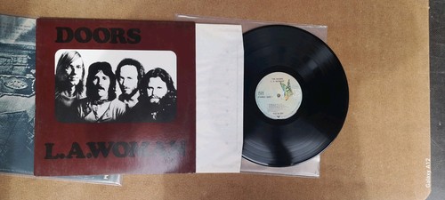 The doors a woman - /,